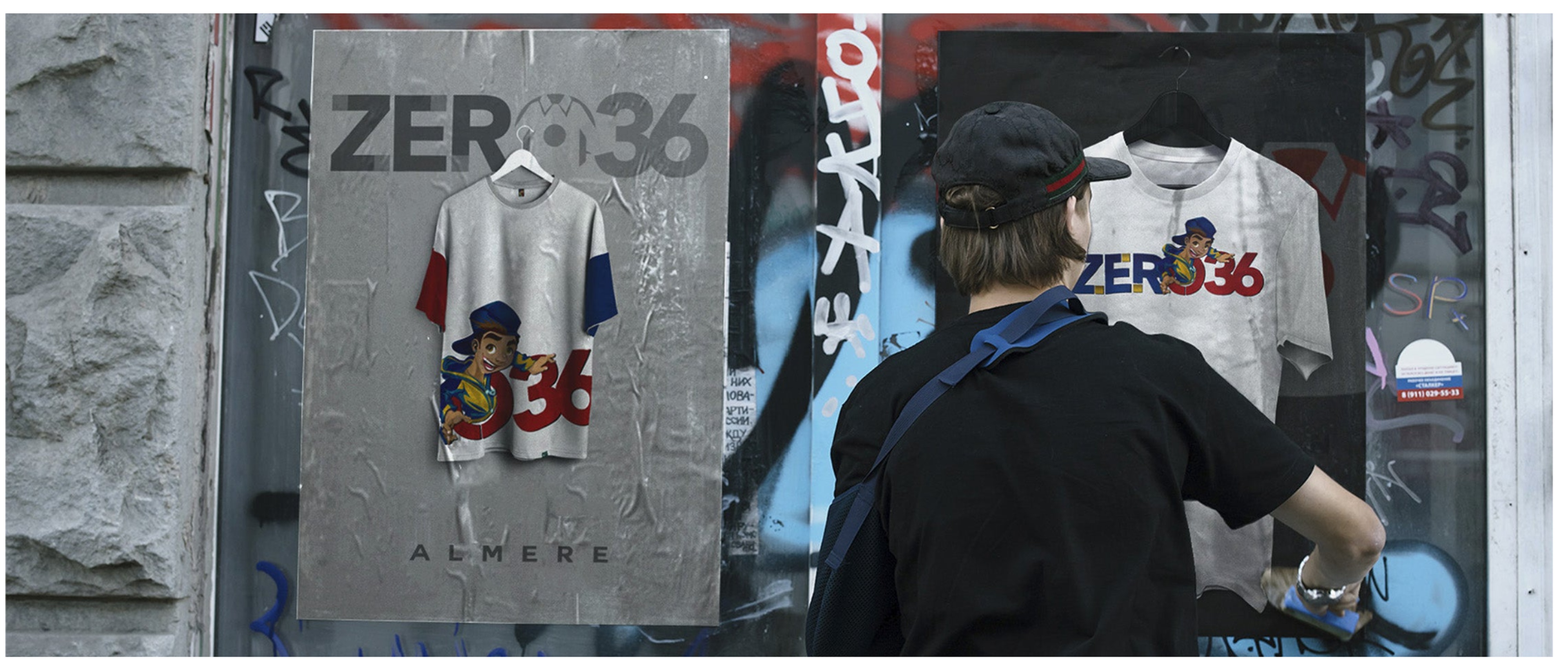 Zero36 poster en t-shirt aan een muur met graffiti